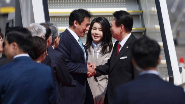 South Korean President arrives in Japan for fence repair summit
